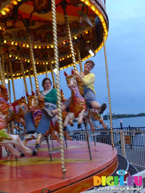 FZ005467 Lib and Jenni on carousel in Cardiff Bay